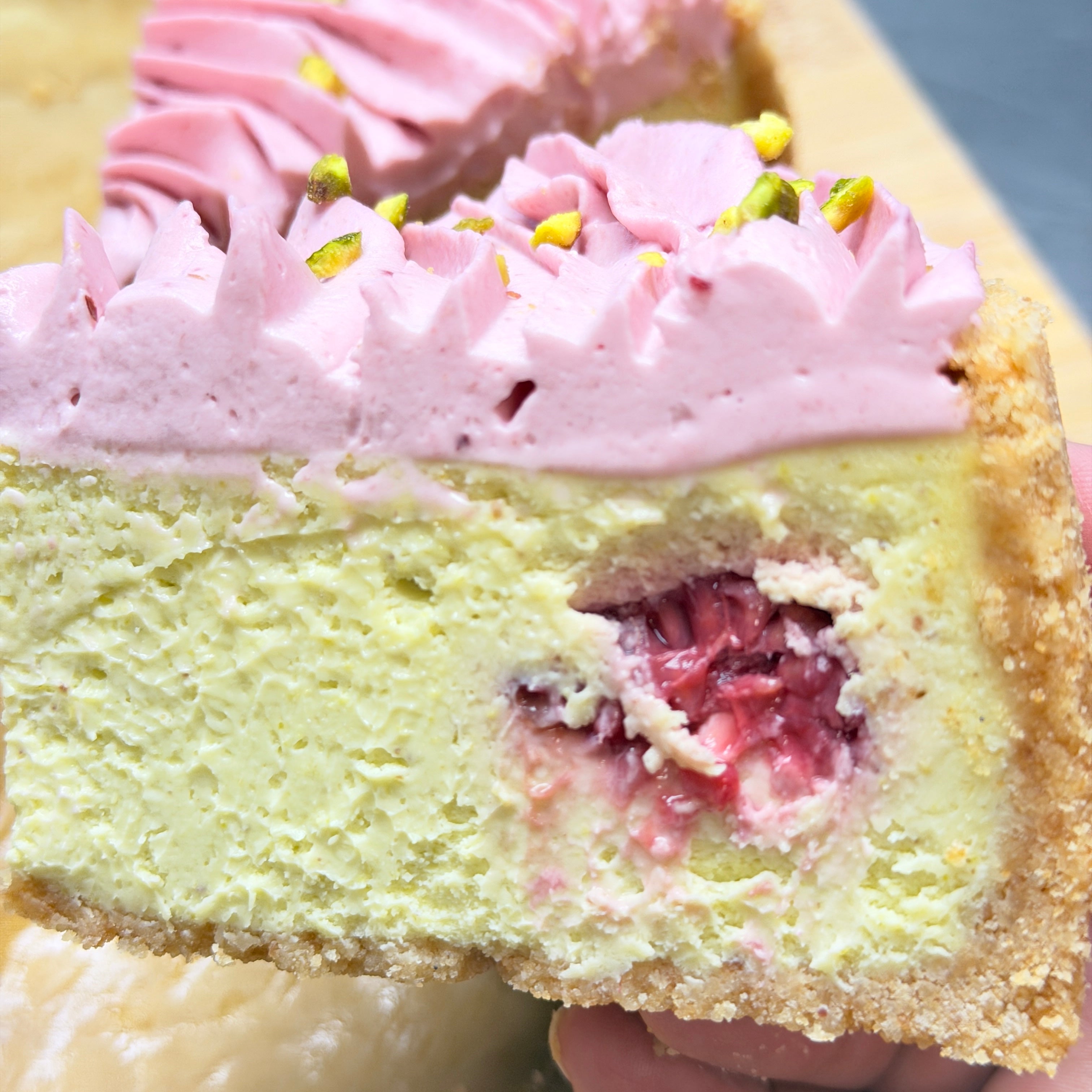 Pistachio raspberry cheesecake